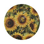 Round tire cover art showing bees hovering over a vibrant cluster of yellow sunflower blooms