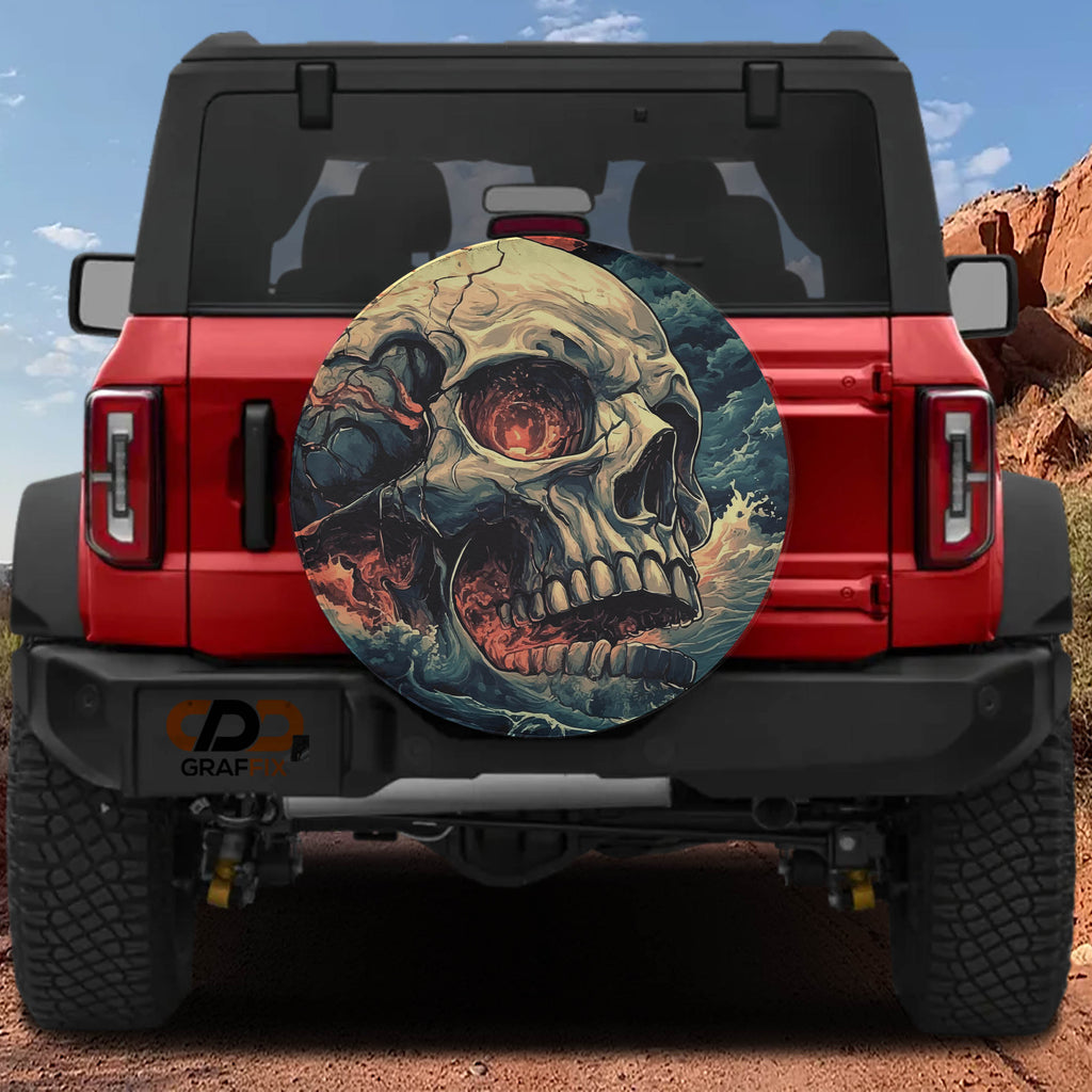 Wave of Damnation spare tire cover on red Ford Bronco rear with cracked skull in ocean swell artwork