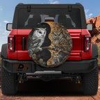 Yin-Yang Owls spare tire cover on a red Jeep Wrangler showing the paired night-and-day owl design on the rear cover