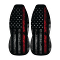 two black and red striped objects with a distressed appearance, resembling a flag or a piece of artwork.