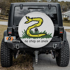 Cartoon snek tire cover detail with humorous take on Dont Tread On Me coiled serpent