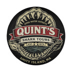 a logo for a company called "Quint's Shark Tours" established in 1975. The logo includes a shark's head and teeth, along with the company's name and founding year.