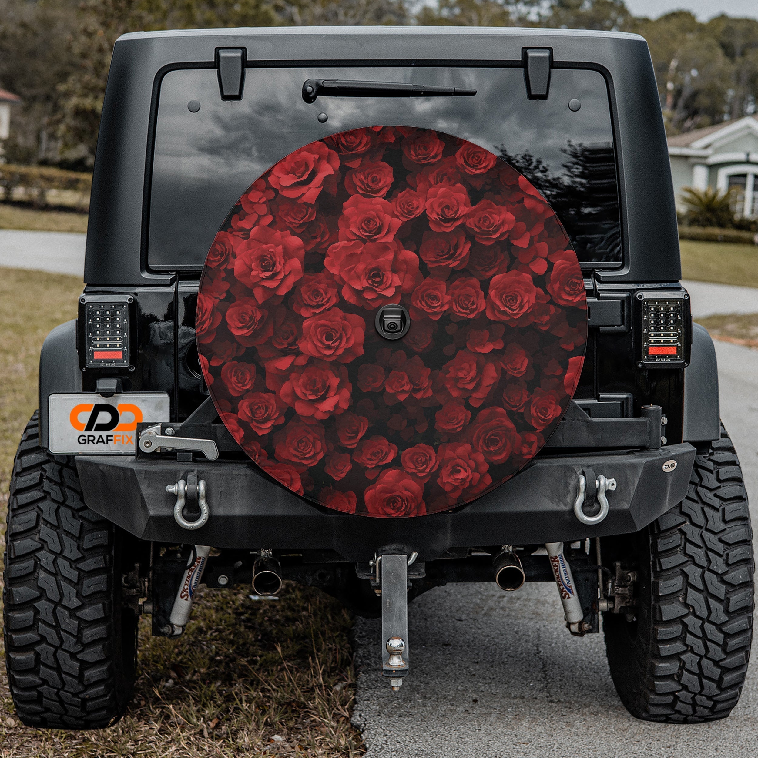 Wheel of Roses spare tire cover rear angle showing dramatic red rose bloom cluster pattern
