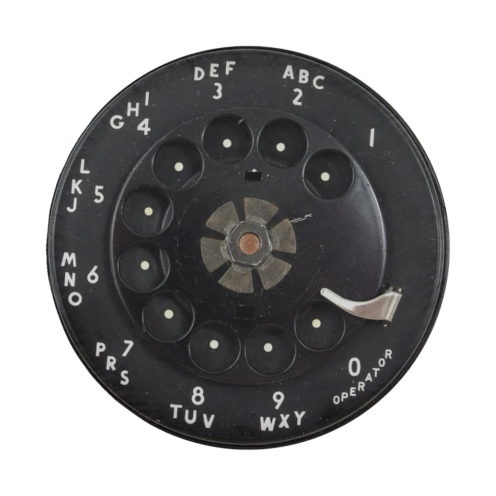 Vintage rotary phone dial spare tire cover flat product view with white letters and numbers