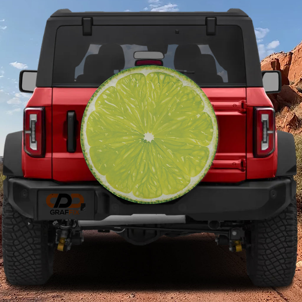 Lime fruit spare tire cover with green citrus slice graphic and zesty sliced lime design