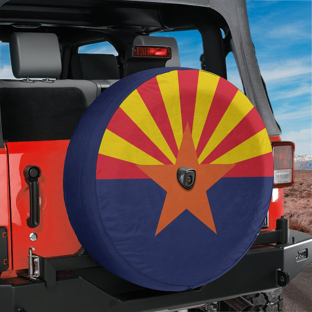 Arizona State Flag spare tire cover on red Jeep Wrangler with sunrise rays and copper star emblem