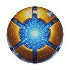 a futuristic, metallic object with a blue and gold color scheme. The object appears to be a metallic sphere or dome, with a complex, angular design and a central, glowing element. The image does not contain any text or additional objects, and the focus is solely on the metallic sphere or dome.