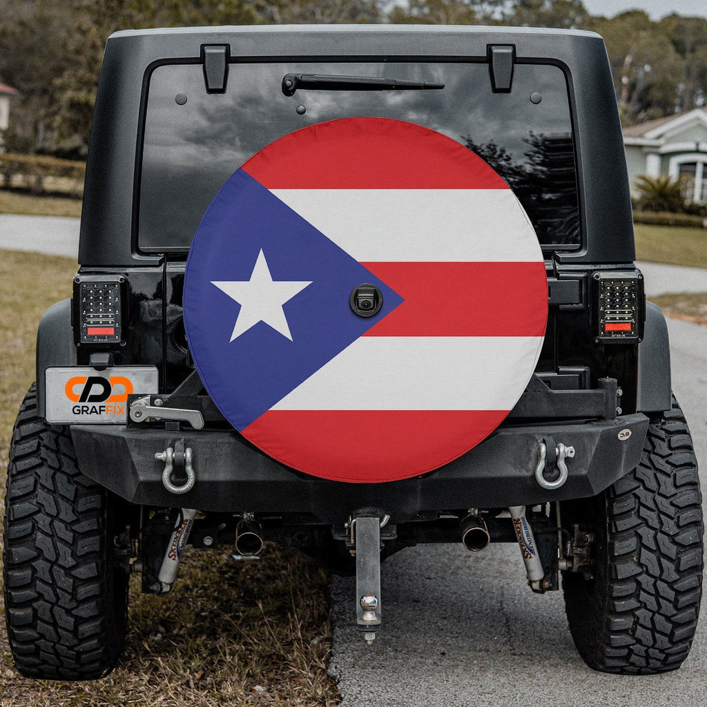 Puerto Rico Flag spare tire cover on black Jeep Wrangler rear with red white stripes and blue triangle