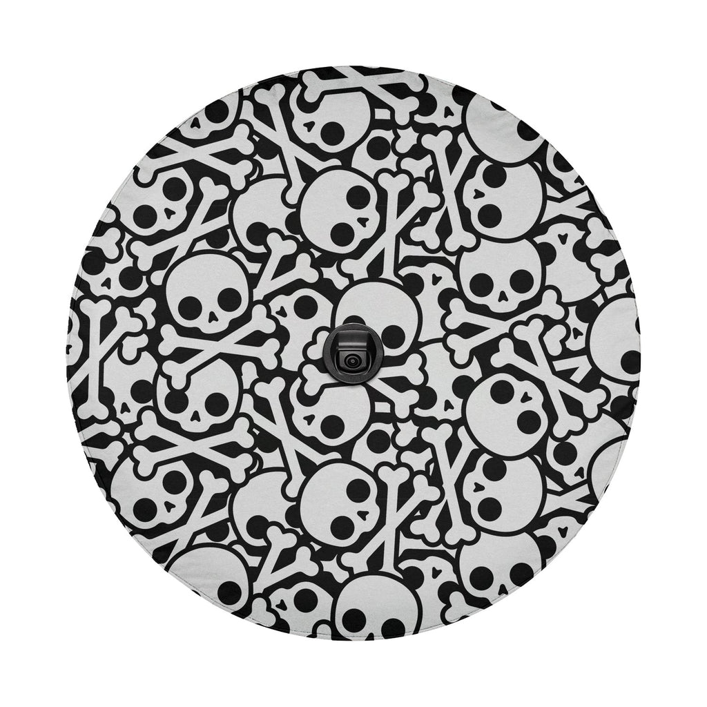 Skull crossbones tire cover front close-up with white cartoon skulls and bones over centered camera cutout