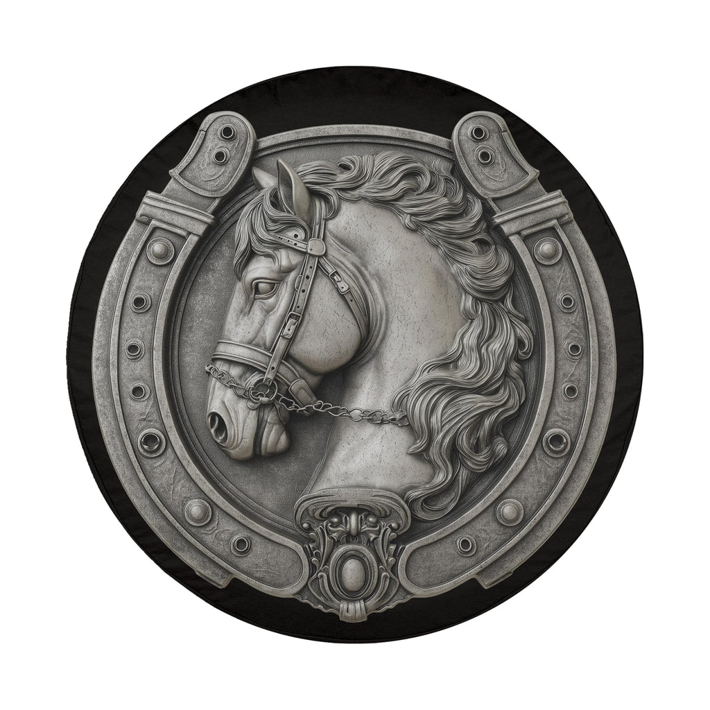 A decorative relief of a horse's head in a horseshoe-shaped frame.