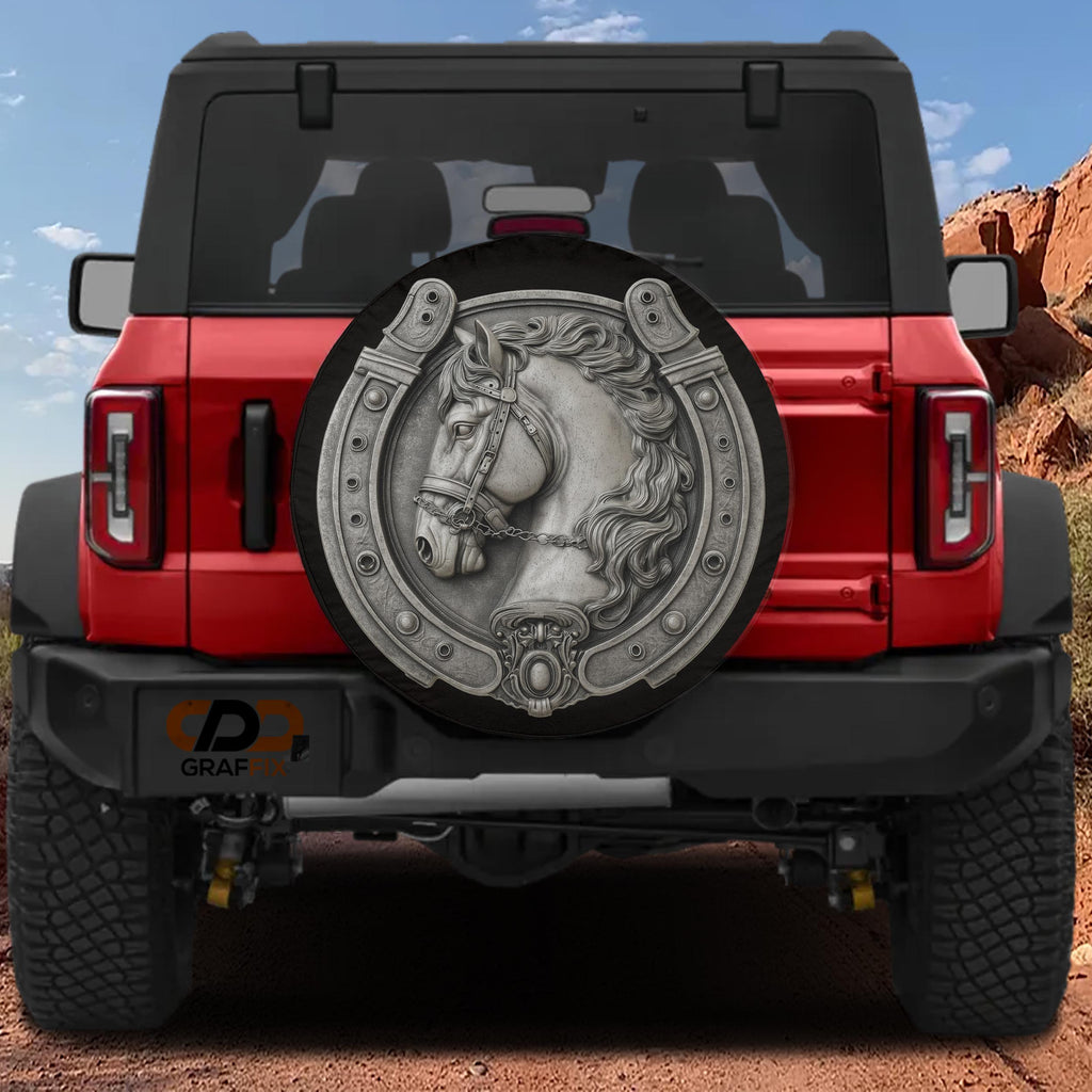 the rear of a red Jeep Wrangler with a silver horseshoe-shaped spare tire attached to the vehicle.