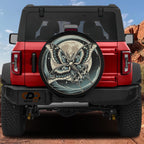 a red Jeep Wrangler with a large, detailed butterfly graphic on the rear tire cover.