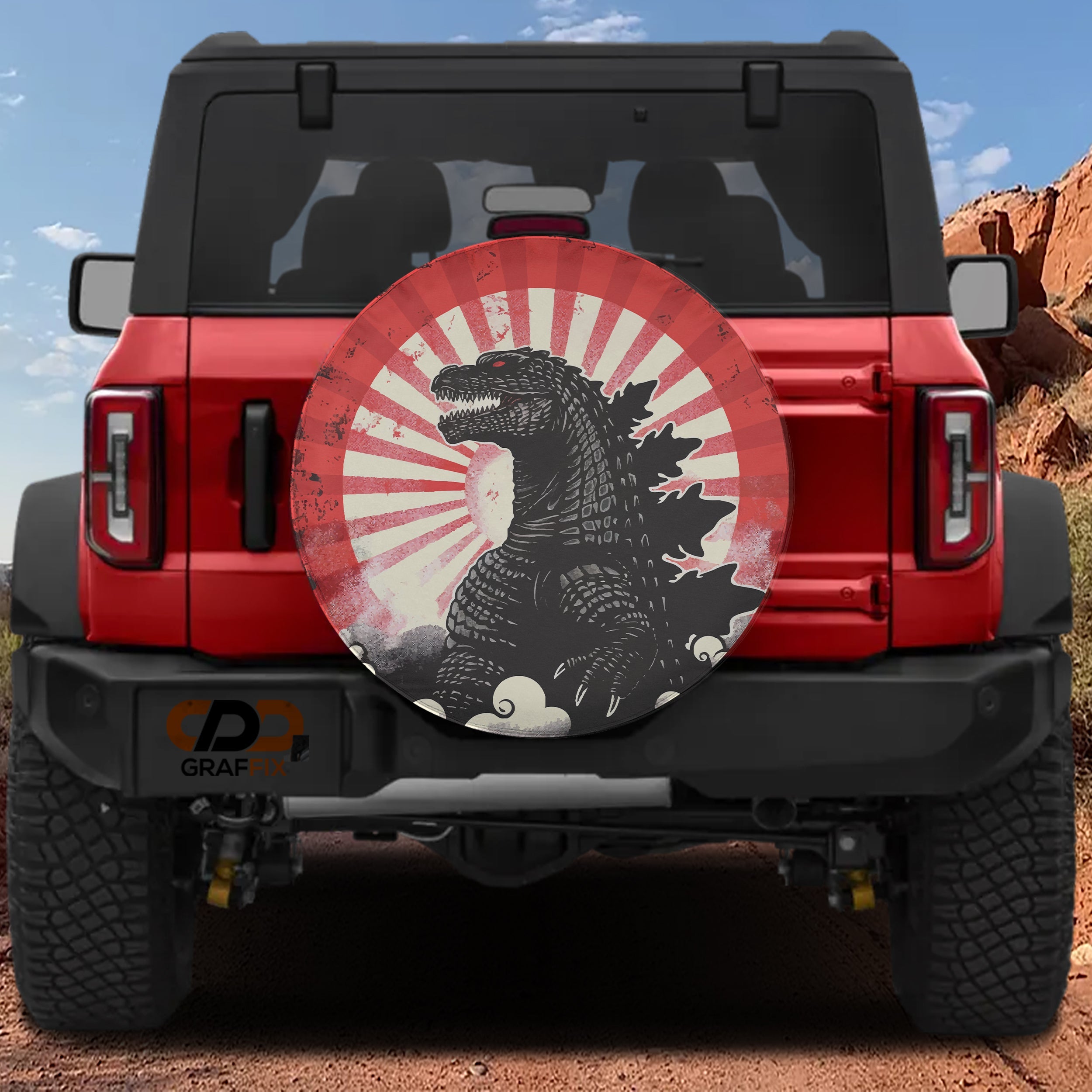 Kaiju Japanese sunburst spare tire cover on red Bronco with black dragon silhouette red rising rays