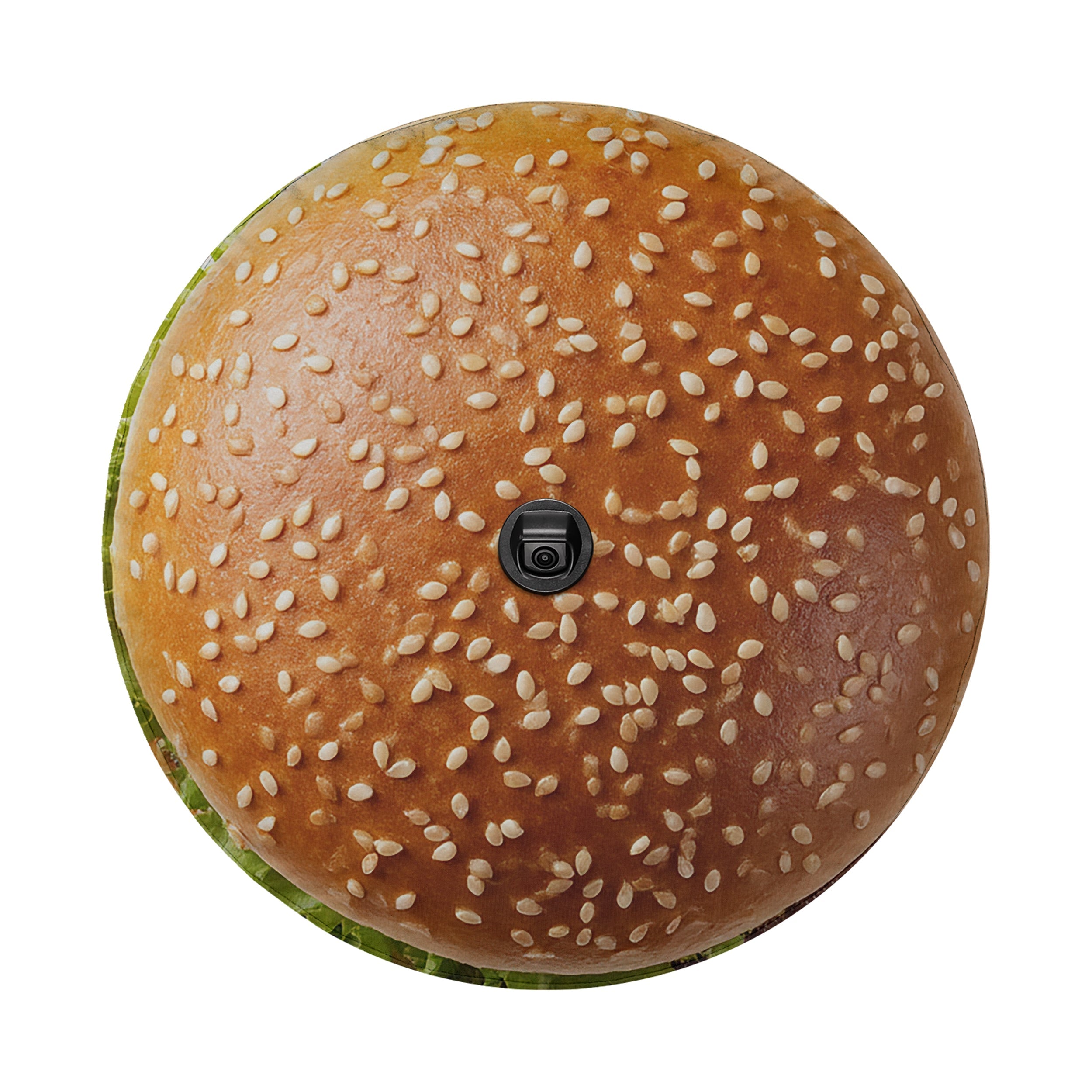 A close-up view of a sesame seed bun with a black camera lens placed in the center.