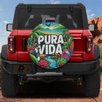 Pura Vida tropical birds spare tire cover with toucan macaw rainforest art on red Ford Bronco SUV
