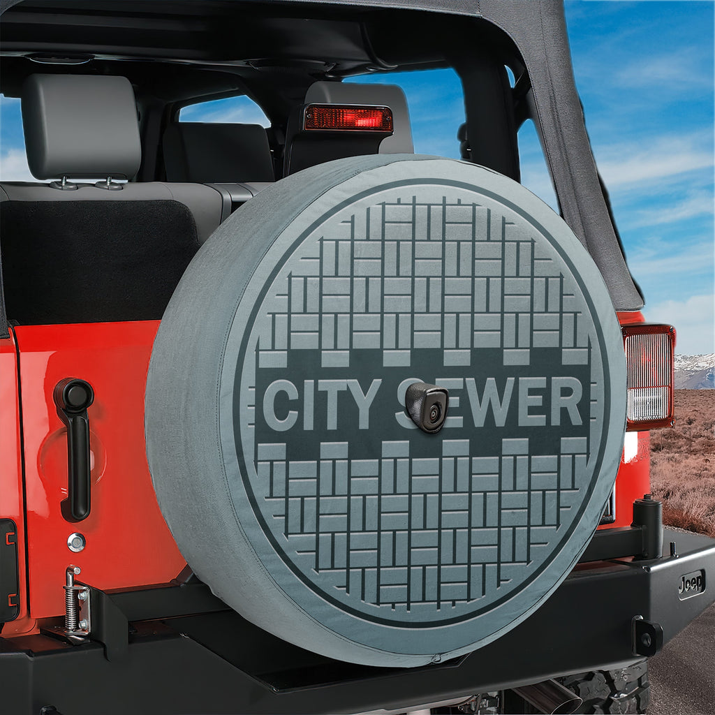 Sewer manhole cover spare tire cover lifestyle shot on SUV outdoors
