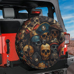 Pirate skulls tire cover on red Jeep Wrangler with weathered skulls in vintage pirate hats and bandanas