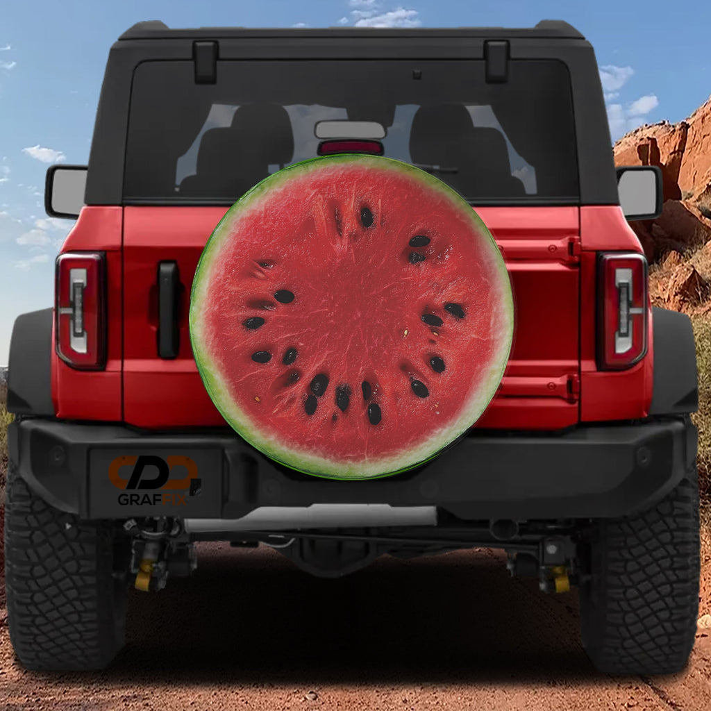Watermelon half spare tire cover with juicy pink fruit slice and green rind summer design