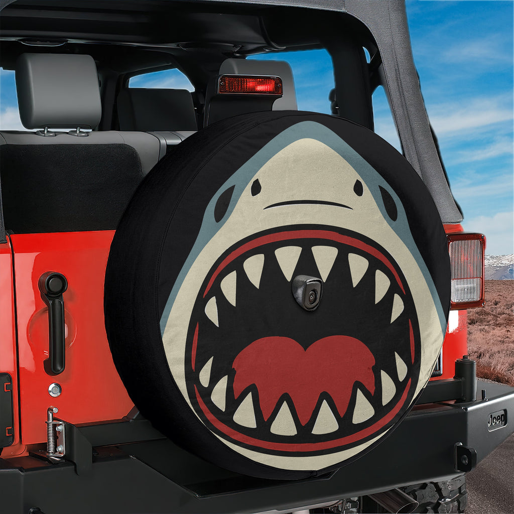 Shark Bite spare tire cover on black Jeep Wrangler with shark face and open jaws print
