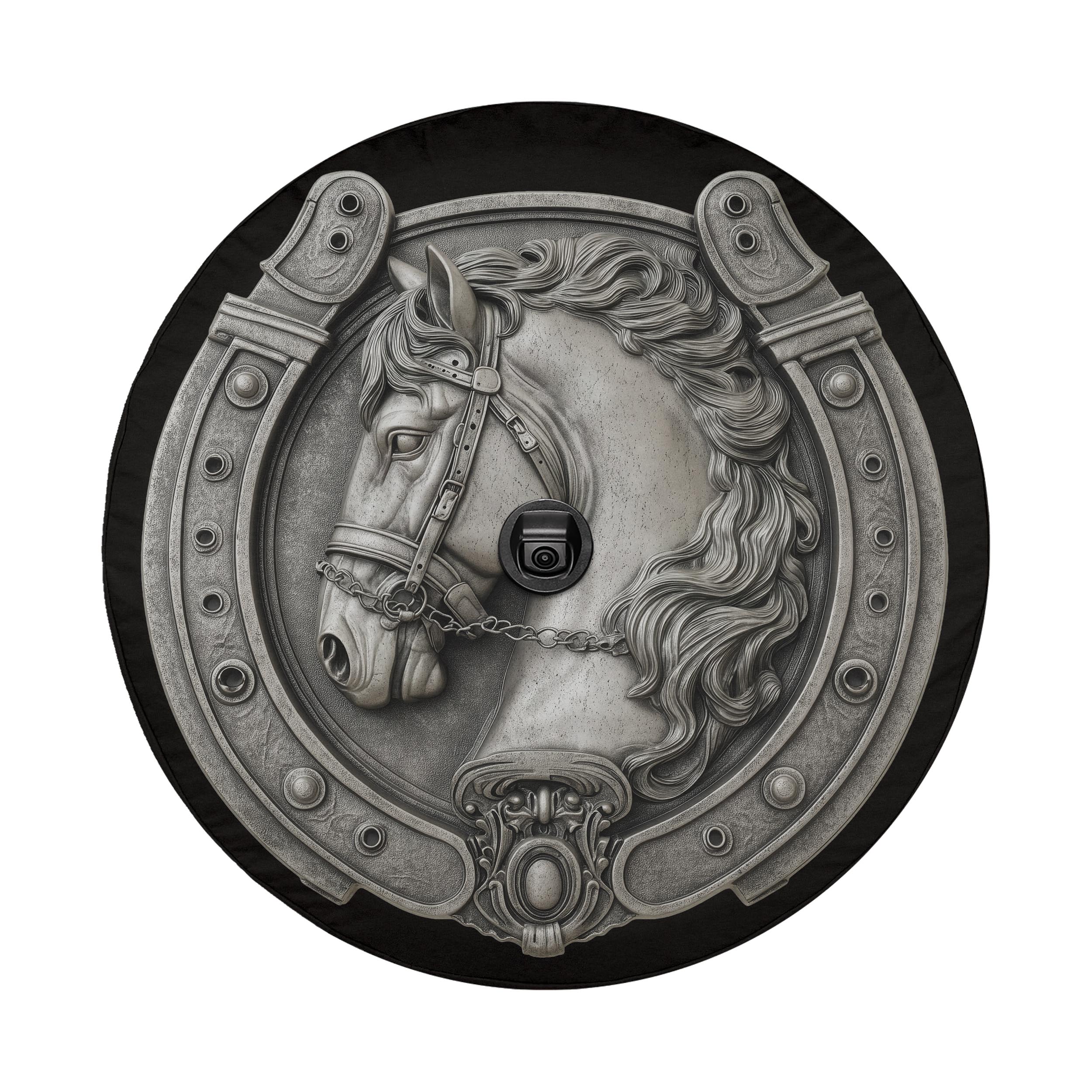 A decorative metal horseshoe with a detailed horse head design, featuring a chain and a small black object.