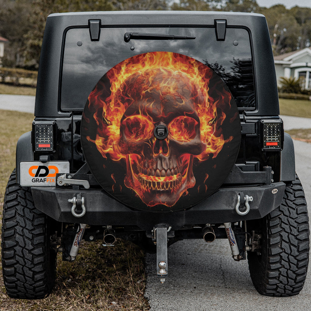 Flaming Skull spare tire cover with fiery skull design displayed on Jeep Wrangler vehicle