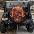 Flaming Skull spare tire cover with fiery skull design displayed on Jeep Wrangler vehicle