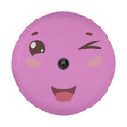 A round, pink object with a smiling face and a black camera attached to it.