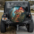 Enchanted Mushroom Cottage spare tire cover on a black Jeep Wrangler showing the fairytale mushroom-house artwork