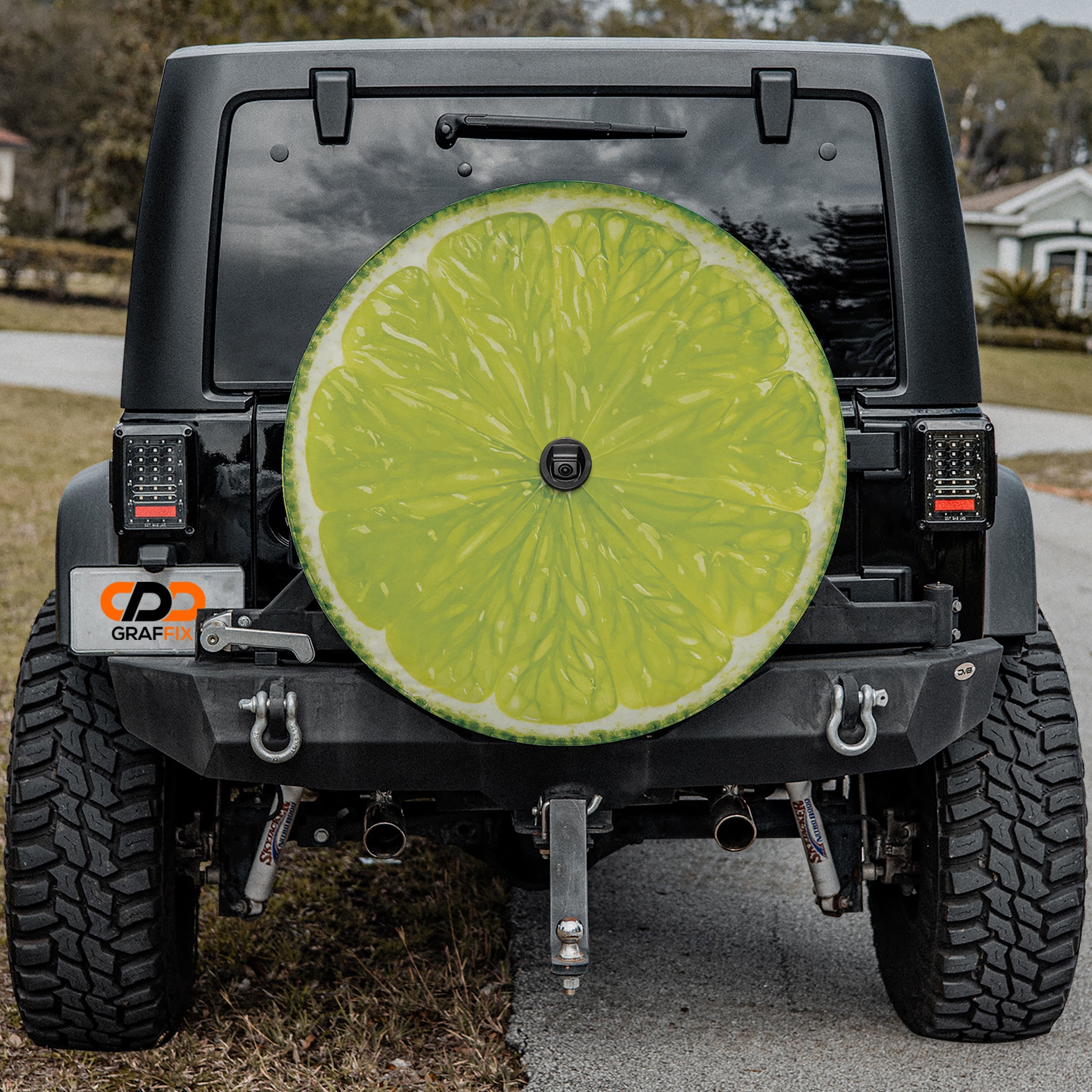 Lime fruit spare tire cover with green citrus slice graphic and zesty sliced lime design