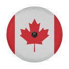 Canadian Maple Leaf flag spare tire cover on black Jeep Wrangler with Graffix plate showing red maple emblem