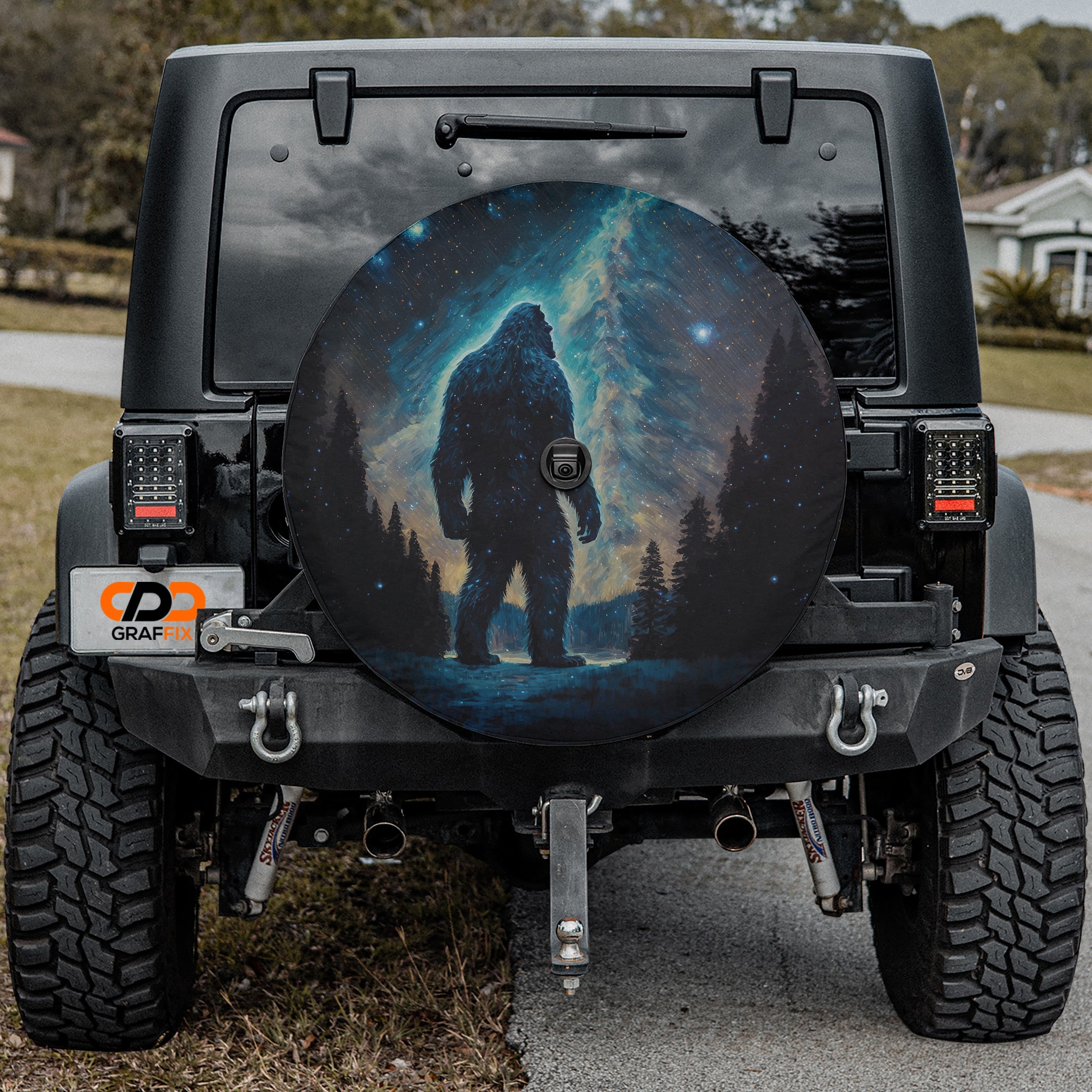 Celestial Yeti tire cover detail showing yeti silhouette beneath glowing celestial night sky