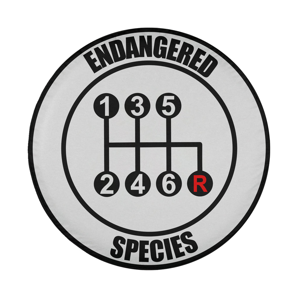 Endangered Species gear shift design spare tire cover flat-lay product view on white background