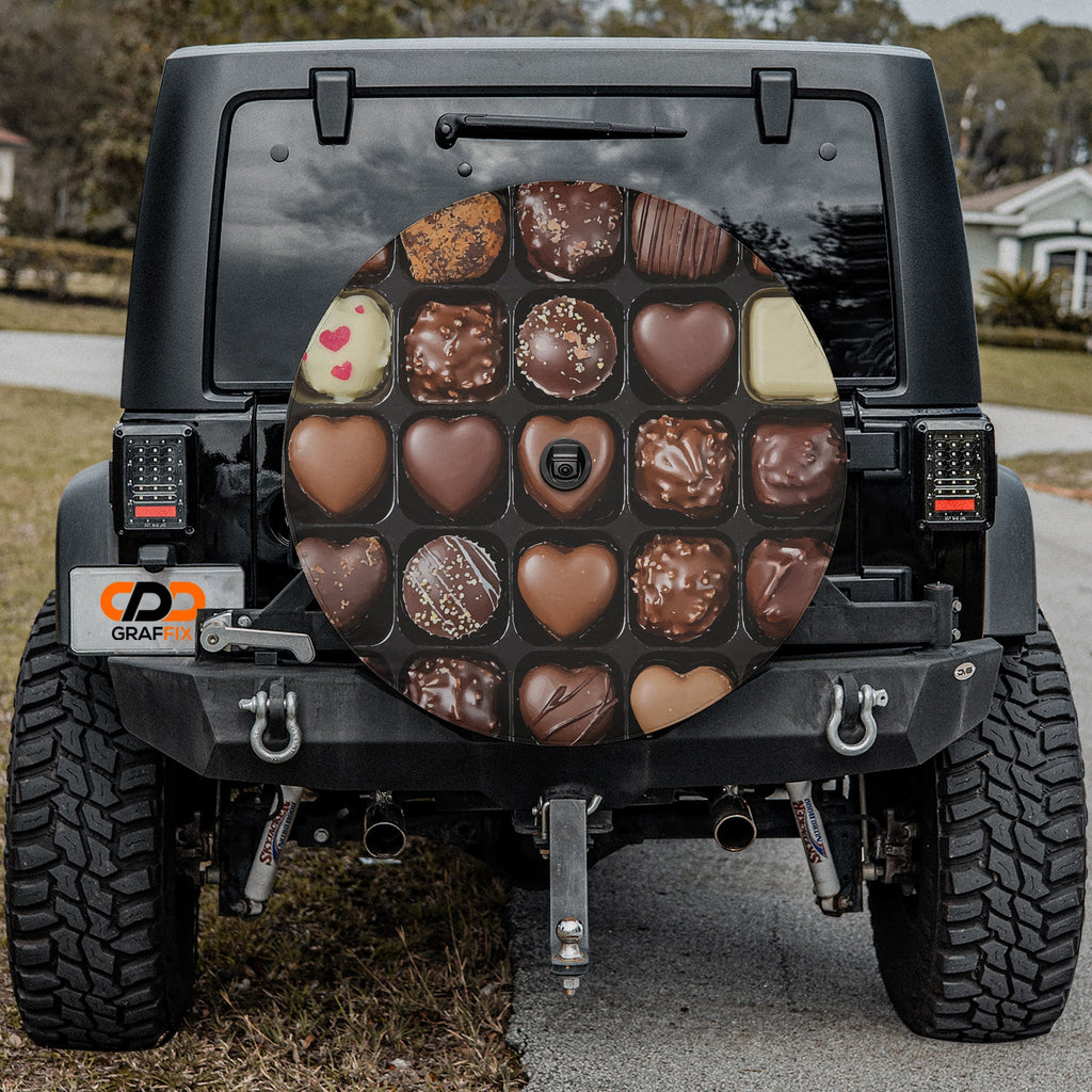 Chocolate Wheel spare tire cover alternate angle showing decadent chocolate sampler box graphic
