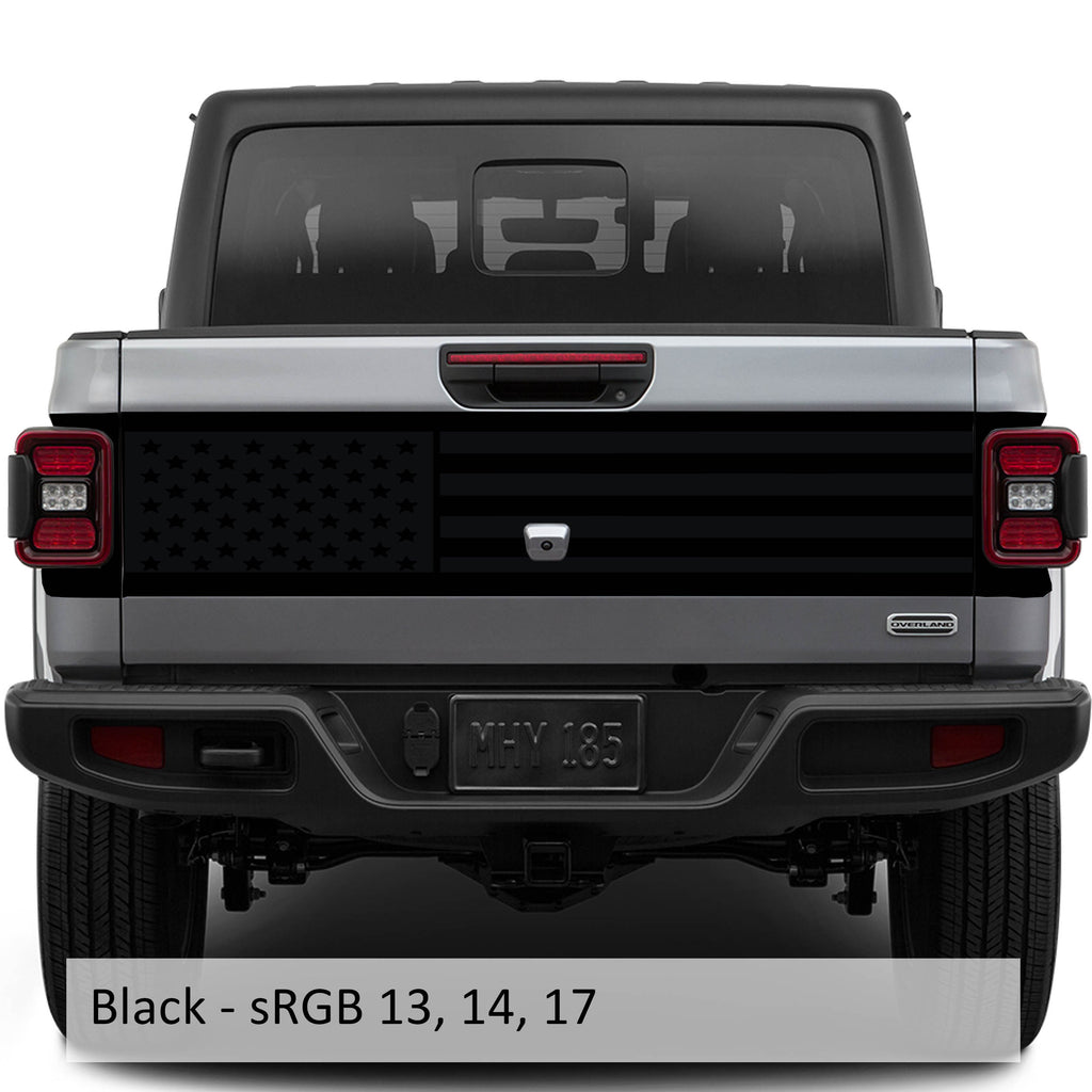 Black JT American flag tailgate blackout vinyl decal installed on Jeep Gladiator tailgate panel