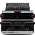 Black JT American flag tailgate blackout vinyl decal installed on Jeep Gladiator tailgate panel