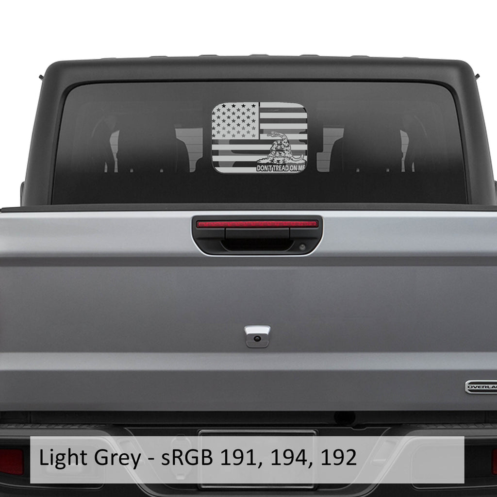 Light gray American Gadsden flag JT rear slide window vinyl decal on Jeep Gladiator hard top glass