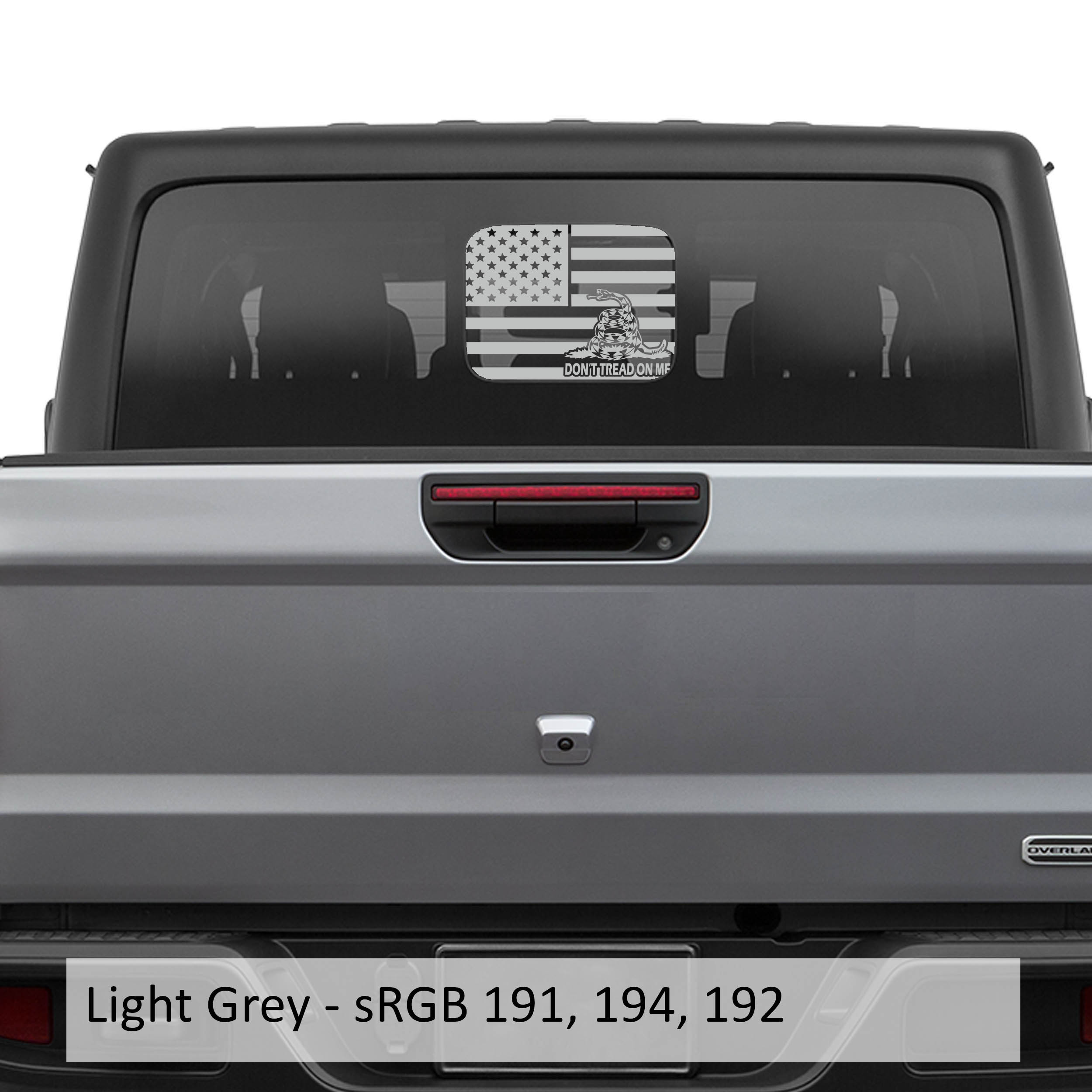 Light gray American Gadsden flag JT rear slide window vinyl decal on Jeep Gladiator hard top glass