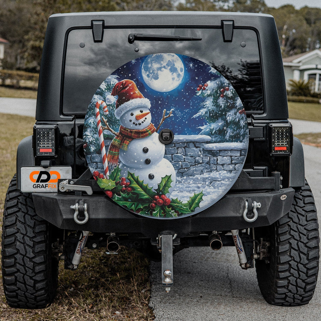 Frostys Midnight Cheer tire cover installed on black Jeep Wrangler with center camera cutout port