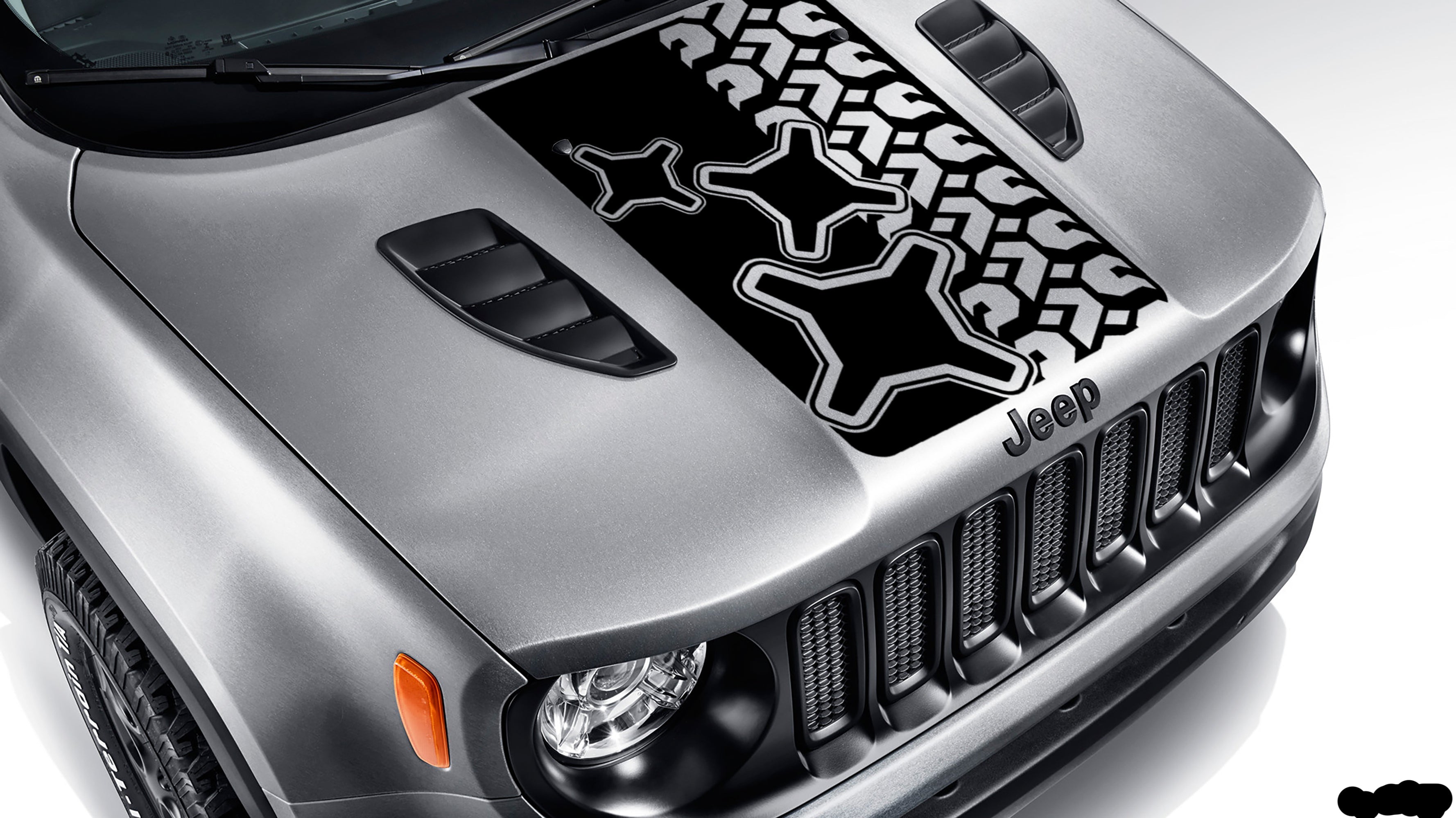 Black brake light and tire tread blackout hood vinyl decal on silver Jeep Renegade hood graphic