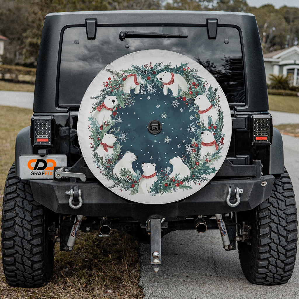 Polar Bear Christmas Wreath spare tire cover installed on black Jeep Wrangler with camera cutout port