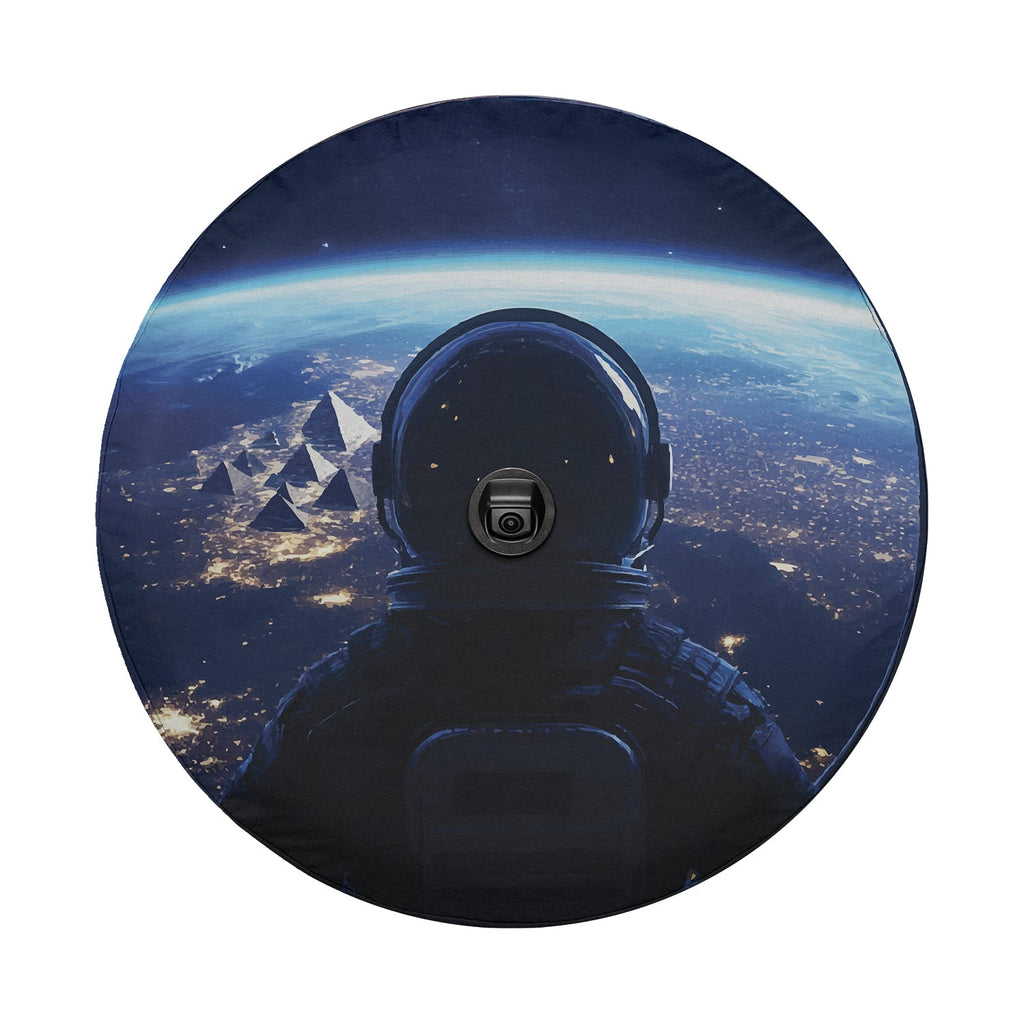 Astronaut silhouette over Earth city lights spare tire cover round design with center camera port