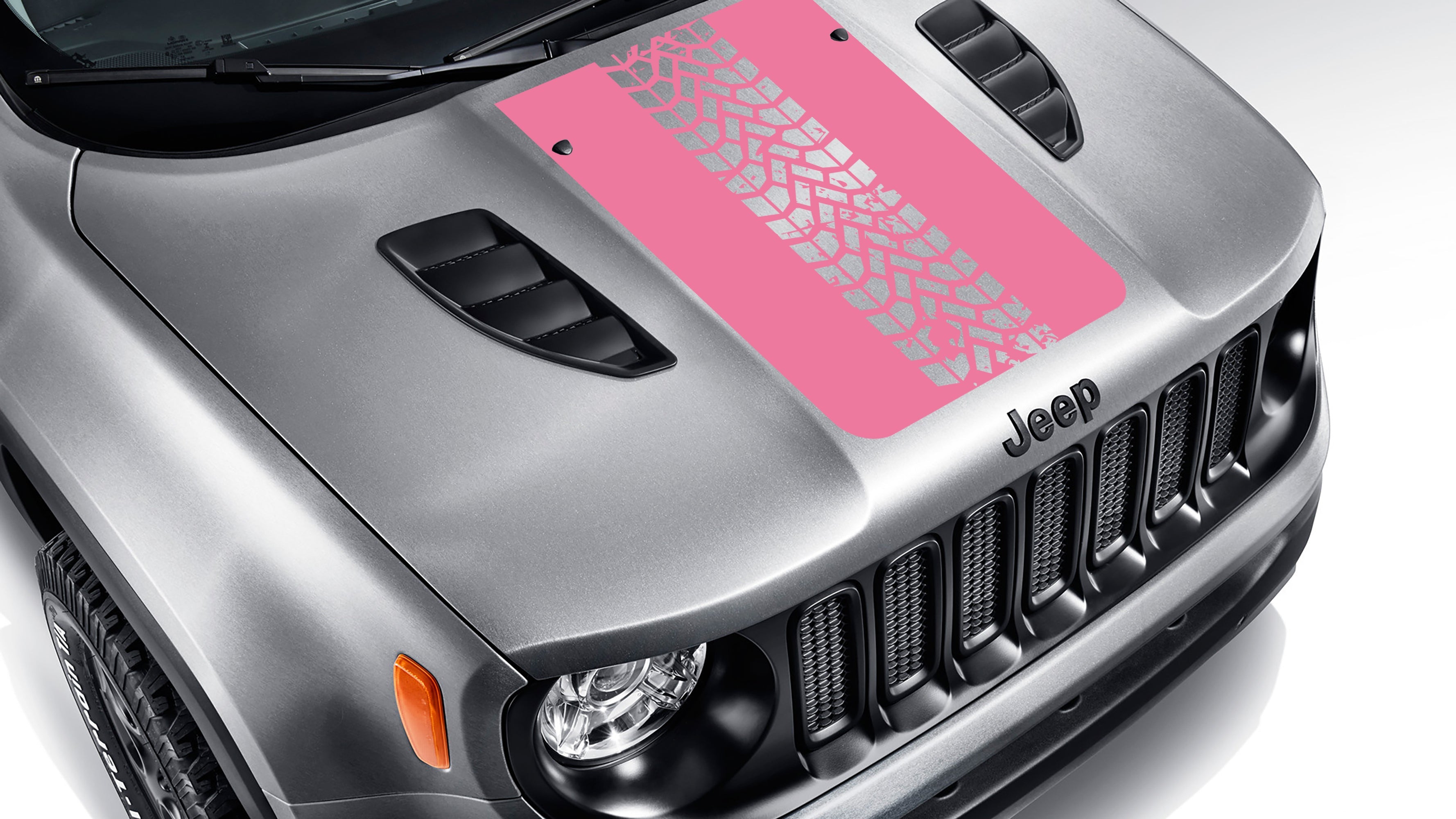 Brilliant blue tire track blackout hood vinyl decal on silver Jeep Renegade hood with tread pattern