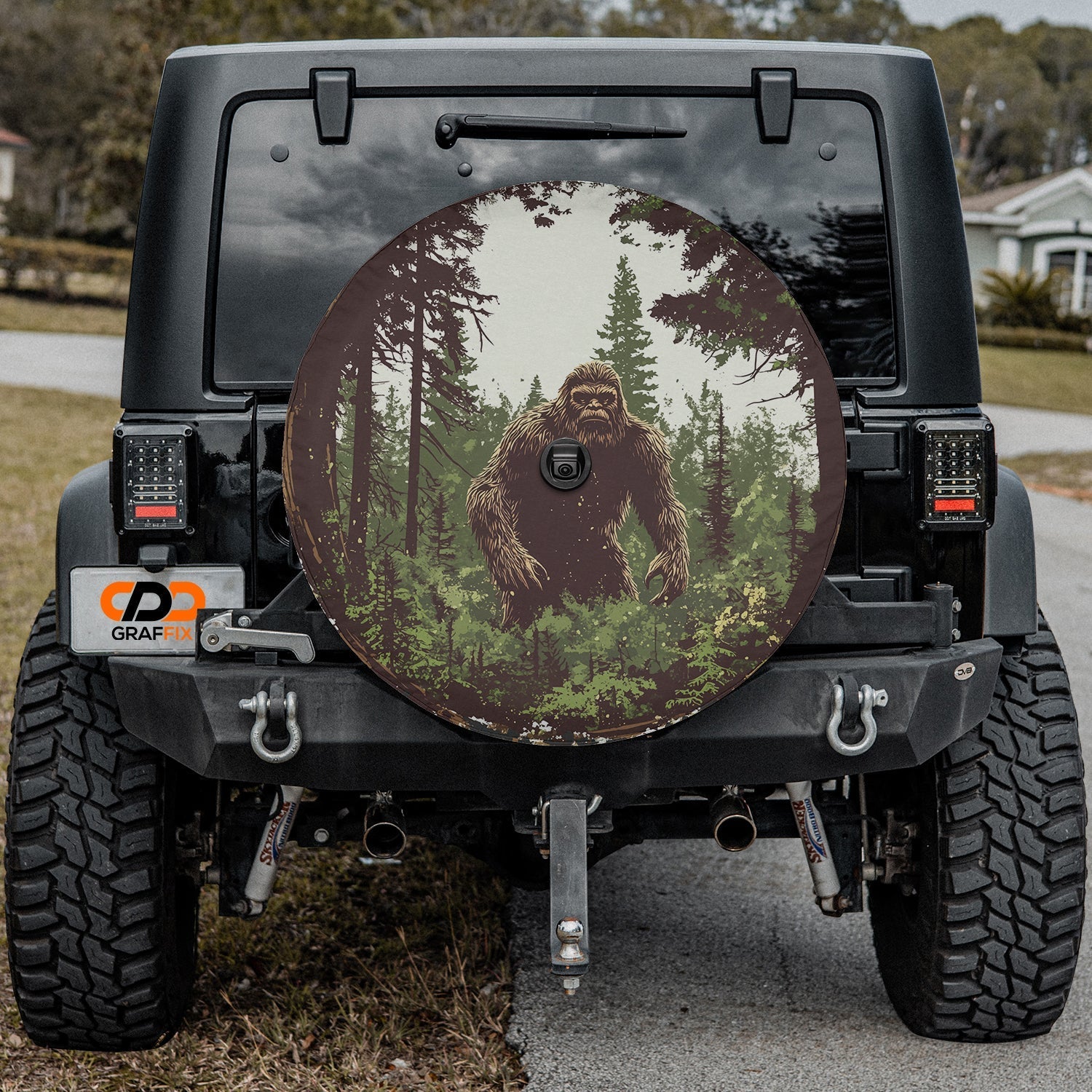Sasquatch lurking forest tire cover with backup camera hole vintage woodland scene on white background