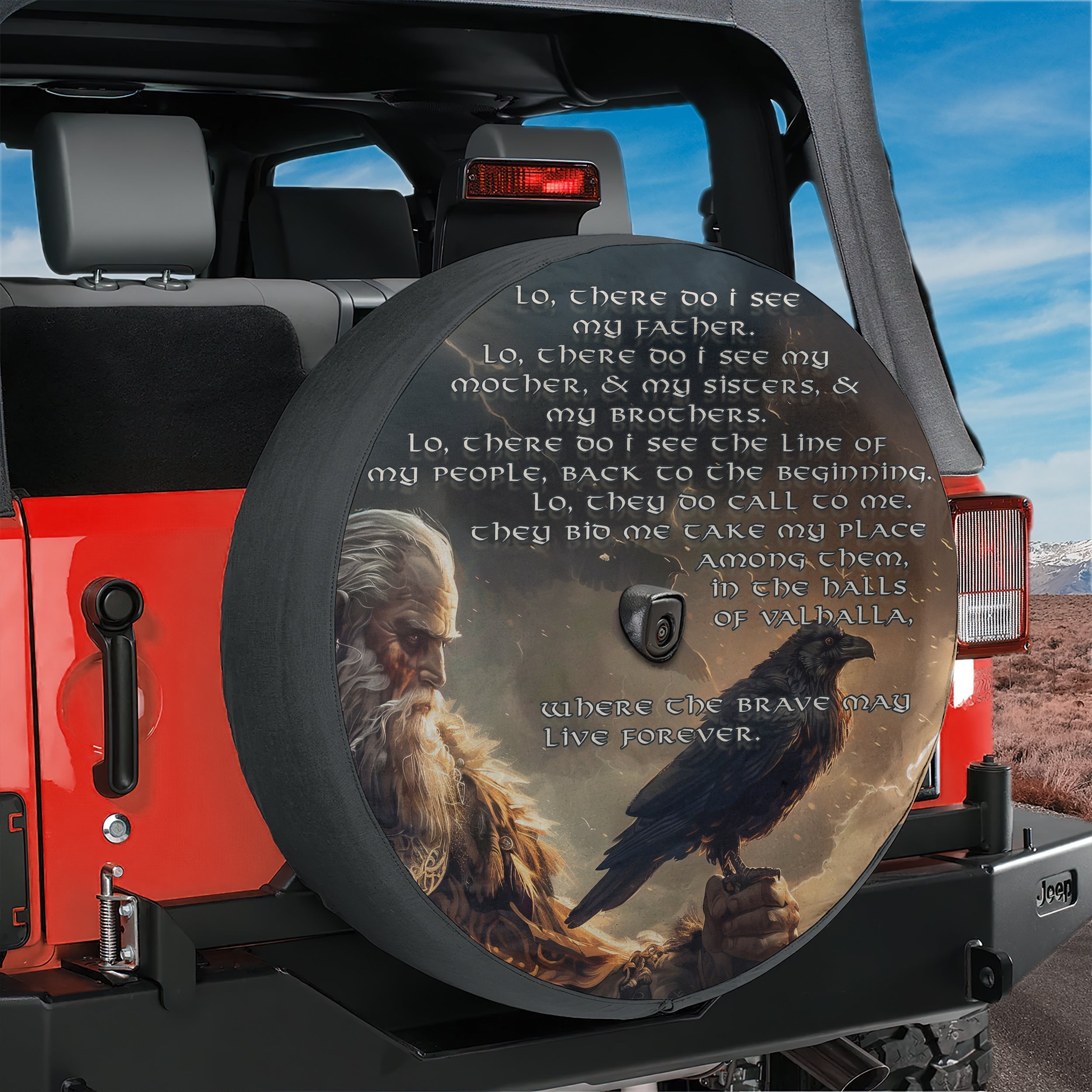 a large, round spare tire cover with a painting of a bearded man holding a bird on his hand. The cover also includes a quote about seeing one's family and friends, along with the phrase "Where the brave may live forever".