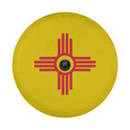 New Mexico State Flag spare tire cover on black Jeep Wrangler rear featuring Zia sun symbol on yellow