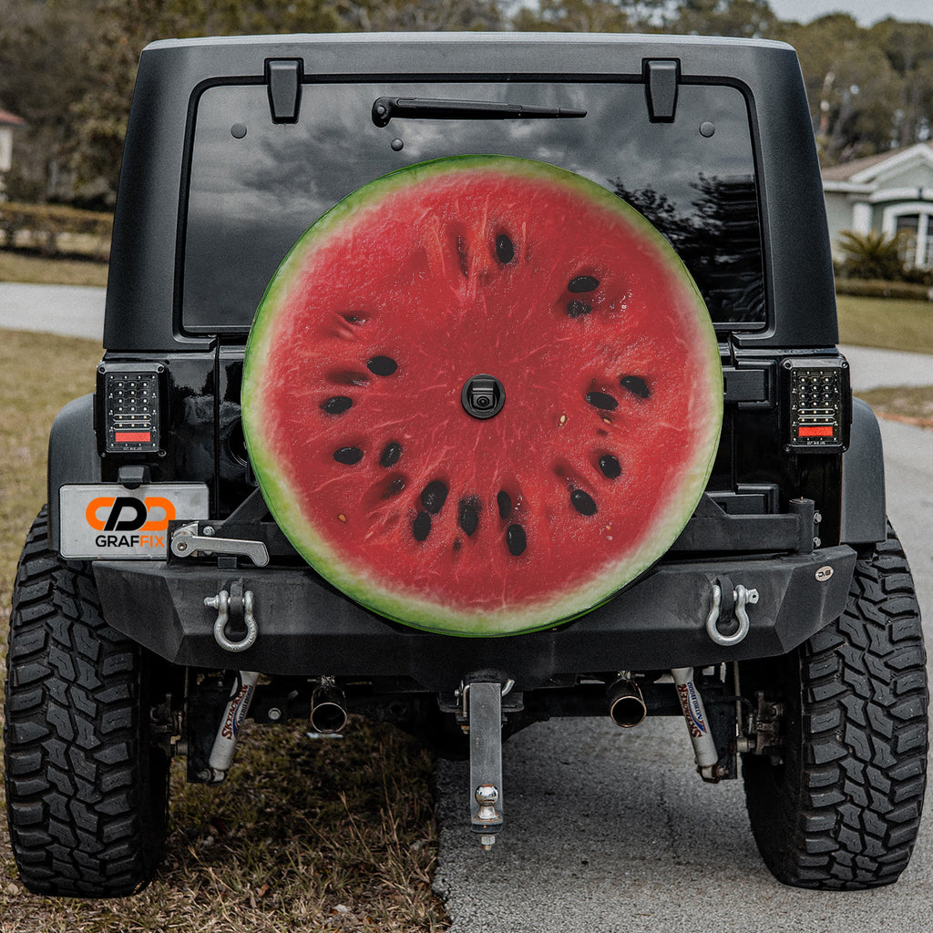 Watermelon half spare tire cover with juicy pink fruit slice and green rind summer design