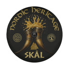 a circular design with a black background and gold accents. The design includes a pair of golden horns, a tree, and a Viking symbol. The text "NORDIC HERITAGE" is written around the top of the image, and "SKÄL" is written at the bottom.