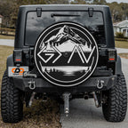the back of a black Jeep Wrangler with a large graphic decal on the rear window.