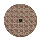 Chocolate chip desert pattern tire cover mounted on black Jeep Wrangler rear in suburban neighborhood