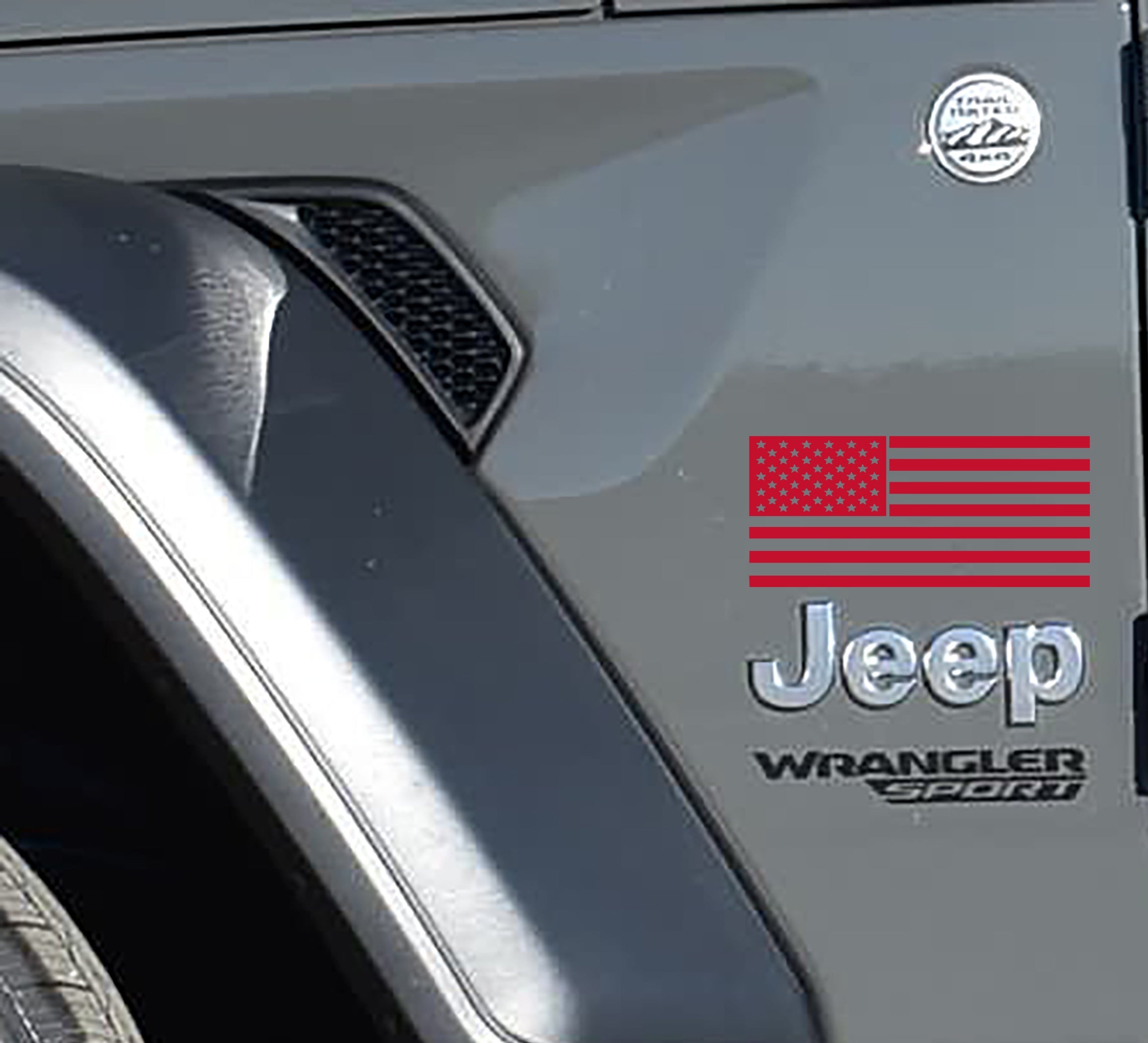 Red American flag fender decal applied to Jeep Wrangler showing front fender install reference